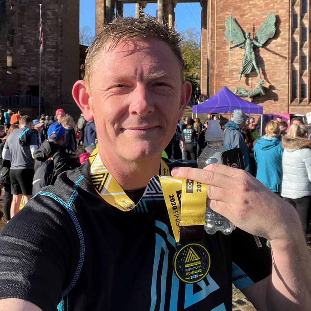 An ambassador, Paul Stokes, after running the Coventry Half Marathon.