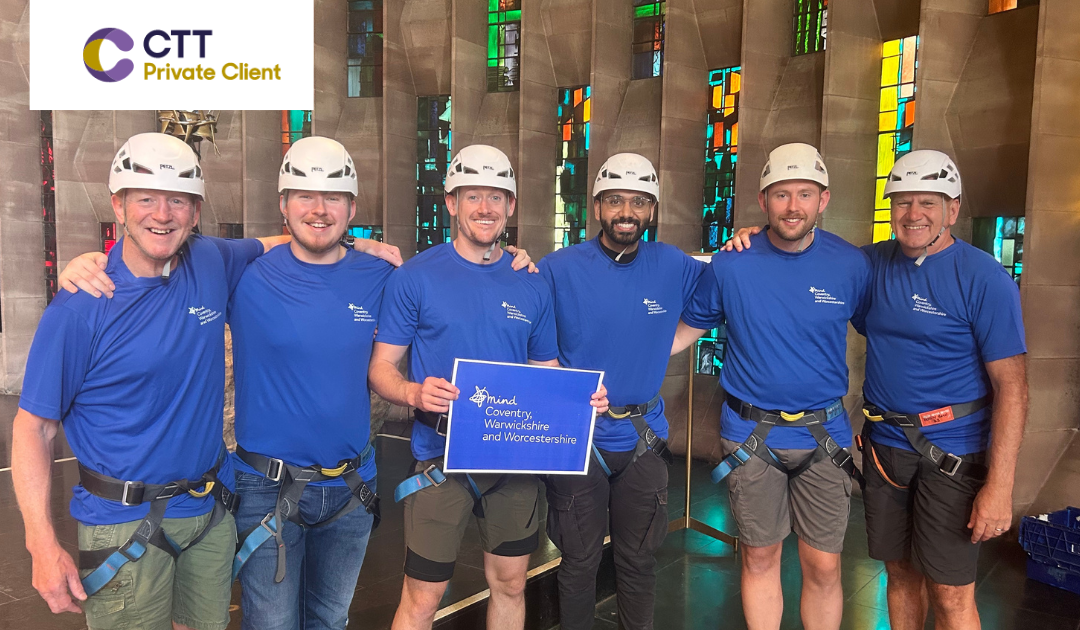 Group of men getting ready to abseil